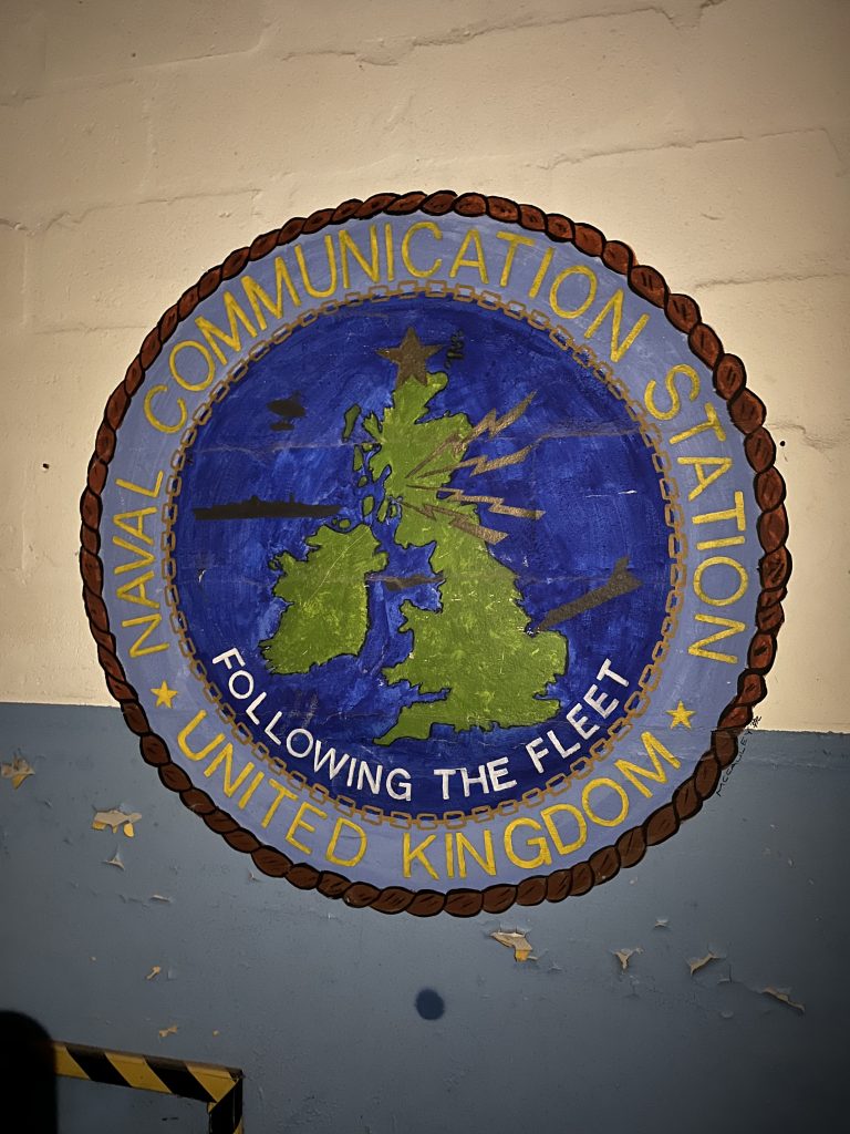 A photo of the original NAVCOMMSTA Thurso signage and decoration.